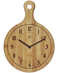 a wooden clock with numbers on the face