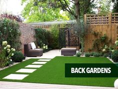 a backyard garden with grass and stepping stones