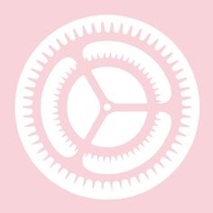 a white clock face on a pink background