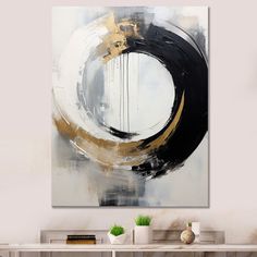 an abstract painting hangs on the wall above a white table