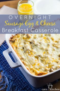 overnight sausage egg and cheese breakfast casserole in a white dish with blue cloth