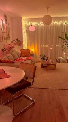 a living room filled with furniture and lights