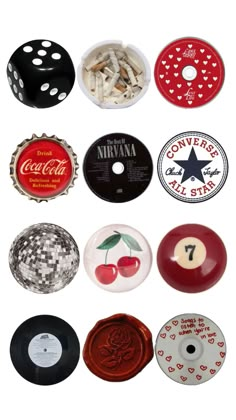 several different types of buttons and magnets on a white background, including coca - cola