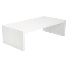 a white table sitting on top of a white floor