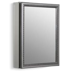 a bathroom mirror with an ornate frame and silver trim on the bottom half of it