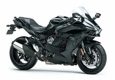 a black motorcycle is shown on a white background