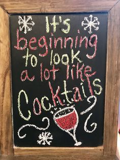 a chalkboard with writing on it that says it's beginning to look like a cocktail