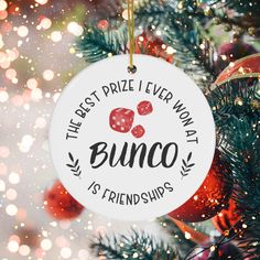 the best prize ever won in bunco is friends christmas ornament hanging on a tree