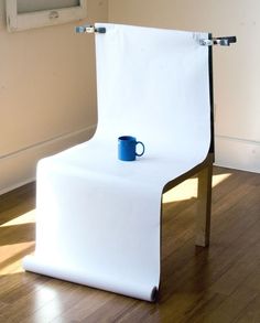 a chair with a coffee cup on it