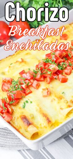 an enchiladas dish with tomatoes and cheese on top in a casserole dish