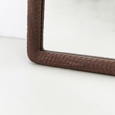 a mirror that is on top of a table