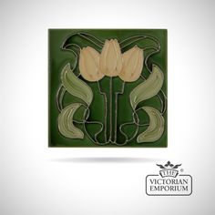 an art deco tile with two flowers on it