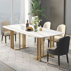 a dining table with chairs around it and a bottle of wine on the table next to it