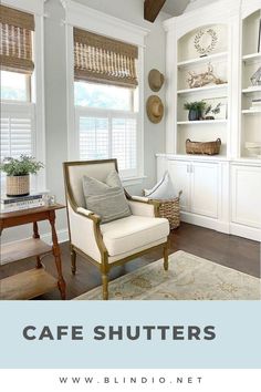 a living room filled with furniture and white walls covered in shuttered window coverings