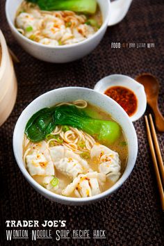 two bowls filled with noodles and vegetables next to chopsticks on a table top