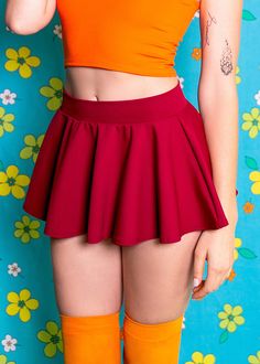 Look sharp and smart with the Brains of the Mystery Gang Skirt. The bold burgundy color exudes confidence, while the mini length adds a touch of playfulness. Channel your inner nerdiness with this flirty skirt! Made of 4-way stretch Dri-tex, which is easy to clean, durable, and fade-resistant making it the perfect outfit for everyday fashion! This skirt is 9 inches long from the waistband. In stock items will ship within 2-4 business days. Sugarpuss Size Chart + Care Instructions Shipping Info Superhero And Villain Costumes, Mystery Gang, Mini Circle Skirt, Outfit For Everyday, Barbie Costume, School Vibes, Pink Doll, Retro Tops, Hero Costumes