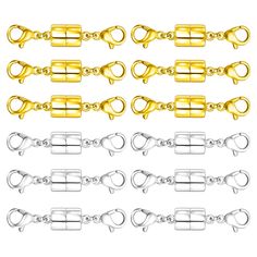 a set of gold and silver metal chain links with lobster clasps on white background