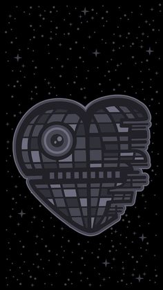 a heart shaped object with stars in the background