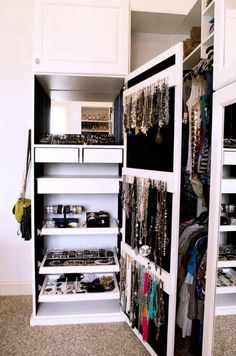 the closet is full of jewelry and necklaces