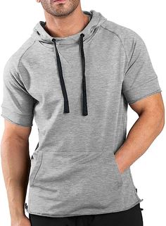 This men's athletic drawstring short sleeve hoodie is perfect for fitness and outdoor activities. Made with an ultra-lightweight breathable cotton blend fabric, this hoodie provides superior comfort and quick-drying performance to keep you dry and cool. The adjustable drawstring waist lets you customize your fit and coverage. Cotton Blend Imported Lace Up closure Machine Wash Material: This short sleeve hoodie is made of soft, breathable and lightweight sweat-absorbent cotton blend fabric. Absor Hooded Cotton T-shirt For Sports, Gray Casual Activewear With Short Sleeves, Casual Gray Activewear With Short Sleeves, Casual Gray Short Sleeve Activewear, Casual Sports Hoodie Top, Casual Hoodie With Kangaroo Pocket For Workout, Casual Workout Hoodie With Kangaroo Pocket, Functional Cotton Hoodie For Sports, Cotton Sports Top With Hood