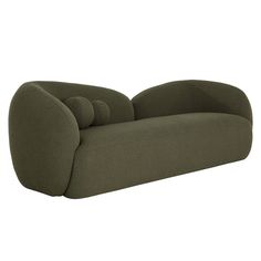 an olive green couch with four pillows on it's back and armrests