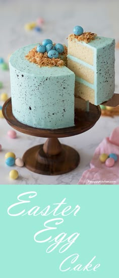 a cake with blueberries on top and the words easter egg cake written in white