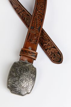 Genuine leather Floral tooled strap Silver floral etched buckle 1.5" wide Tan overlay with black underlay Faster Horses Festival, Women Belt, Leather Floral, Mens Flannel, Fragrance Gift, Fragrance Gift Set, Cold Weather Accessories, Boots For Sale, Denim Outfit