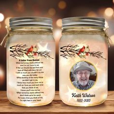 two mason jars with an image of a man's face on the front and back