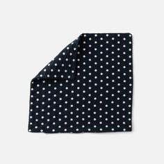 a black and white polka dot pocket square