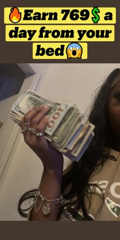 a woman is holding money in her hand and the words earn $ 69 a day from your bed