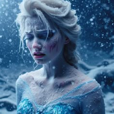 a woman with white hair and blue makeup standing in the snow