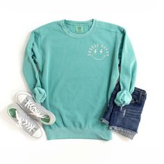 Looking for a cute versatile top to wear? Make sure to grab one of our Graphic Sweatshirts! This soft and comfortable shirt is the perfect top for any outfit. It can be paired with biker shorts, Jeans, or the classic stay at home sweats! This sweatshirt is true-to-size, so be sure to order your regular size! If you are looking for a more oversized look, make sure to size up. Comfy Green Cotton Top, Casual Washed Sweatshirt For Spring, Casual Soft-washed Tops For Leisure, Comfy Cotton Crew Neck Tops, Comfy Cotton Tops With Graphic Print, Casual Acid Wash Cotton Sweatshirt, Green Washed Cotton Sweatshirt, Casual Crew Neck Soft-washed Sweatshirt, Casual Acid Wash Soft-washed Sweatshirt