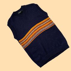 Vintage Y2K 00's Unisex Navy Blue Yellow Striped Dark Academia Preppy Skater Knit Sweater Vest Size M/L Condition: 9/10 Size: feels like M/L Model is size UK6-8/EU34/S and is 164 cm tall (5.4ft) The item is preloved/vintage so some signs of natural wear and age might appear ✨ Casual Navy Wool Top, Multicolor Wool V-neck Sweater, Navy Wool Winter Tops, Multicolor Cotton Sweater Vest For Winter, Casual Sleeveless Wool Sweater, Blue Knit Vest For Fall, Blue Knitted Wool Tops, Navy Cotton Sweater Vest For Winter, Retro Sleeveless Sweater For Winter