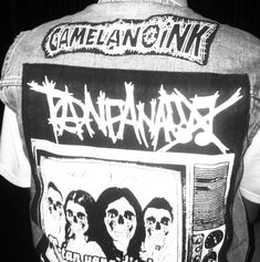 the back of a man wearing a shirt that says, gamelancik'nx