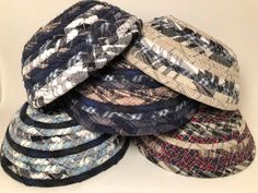 several hats stacked on top of each other