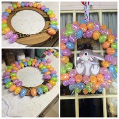 an easter wreath made out of balloons and plastic eggs with a stuffed bunny in the middle