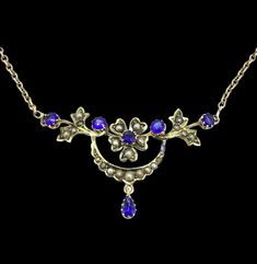 Antique Edwardian Lavaliere Necklace fully hallmarked 9CT Gold blue Sapphires outstanding beautiful signed G&W  This magnificent necklace measures 17 inches from clasp to clasp and the pendant measures 4.5cm x 2.5cm to the end of the sapphire drop  Condition is very good no stones missing but a small repair sign to the back of the pendant is hardly noticeable.  If you have any doubts do not hesitate to ask All pieces are unique I aim to provide you with a 5 star service and customer satisfaction is my priority.  All my items are vintage and pre owned so at times they will have signs of age but I try my very best to describe them with accuracy. Your purchase will be carefully packed to protect it. If you wish it wrapped as a gift for someone then do let me know please. Blue Sapphire Necklace, Monogram Pendant, Edwardian Jewelry, Gold Brooches, Silver Brooch, Sapphire Necklace, White Rose Gold, Locket, Blue Sapphire