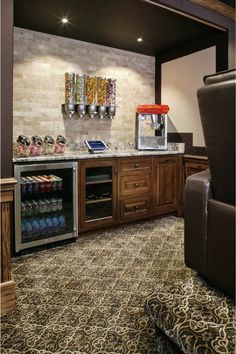 a coffee bar in the middle of a room with chairs and other items on display