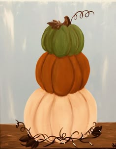 a painting of pumpkins stacked on top of each other