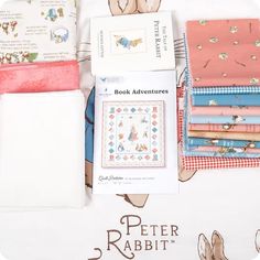 there are many different patterns and fabrics on this table cloths, including one for peter rabbit