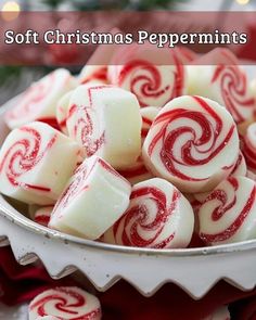 a bowl full of white and red peppermints with the words soft christmas peppermints