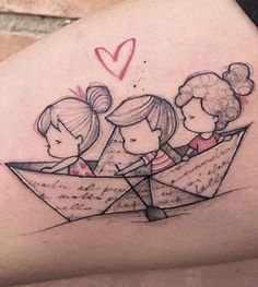 a woman's thigh with an origami boat and three girls on it