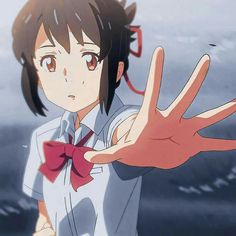 an anime character is holding out her hand to the camera while wearing a white shirt and red bow tie