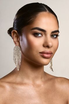 Defined by swaying rows of diamante tassels, these aptly-named earrings are guaranteed to set the sparkle standard at your next event. Try styling Waterfall with a sleek bun to show off all these gold earrings have to offer.Features - Gold toned - Diamante embellishments- Curved design- Tassel detail - Stud fastening Product Information Designed exclusively by Club L London Gold-toned brass (60% Brass, 40% Glass) SKU: CL134513007 Returns InformationEarrings and pierced jewellery cannot be returned for health and hygiene reasons. Gold Tassel Earrings, Fishtail Maxi Dress, Club L London, Tassel Drop Earrings, Red Dress Maxi, Statement Drop Earrings, Pierced Jewelry, Light Year, Sleek Hairstyles