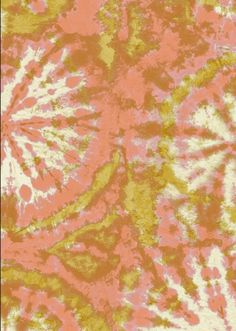 an orange and yellow tie dye pattern with white spots on it's edges,