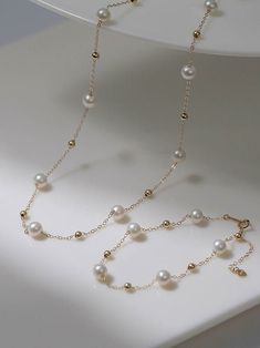 Featuring a celestial-inspired pendant and lustrous pearls, it offers timeless elegance. Adjustable for versatile wear, it's a celestial touch to elevate any ensemble. Metal: 14K Gold Filled Gemstone: Freshwater Pearls Pearl Diameter：6-7mm Length: 400-450mm Weight: 3.2g Sliver Earrings, Necklaces Pearl, Slider Necklace, Jewelry Traditional, Pearl Chain Necklace, Pearl Necklaces, Tiger Eye Stone, Chain Necklaces, Enamel Earrings