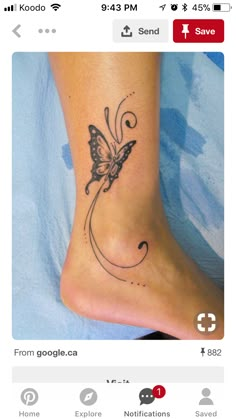 a woman's foot with a butterfly tattoo on it