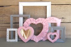 pink and grey frames with hearts on them