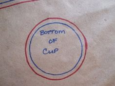 the bottom half of a brown bag with blue and red writing on it