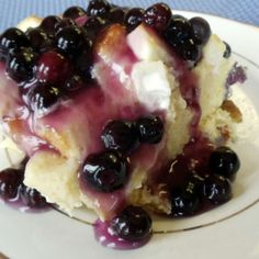 a piece of blueberry cheesecake on a plate